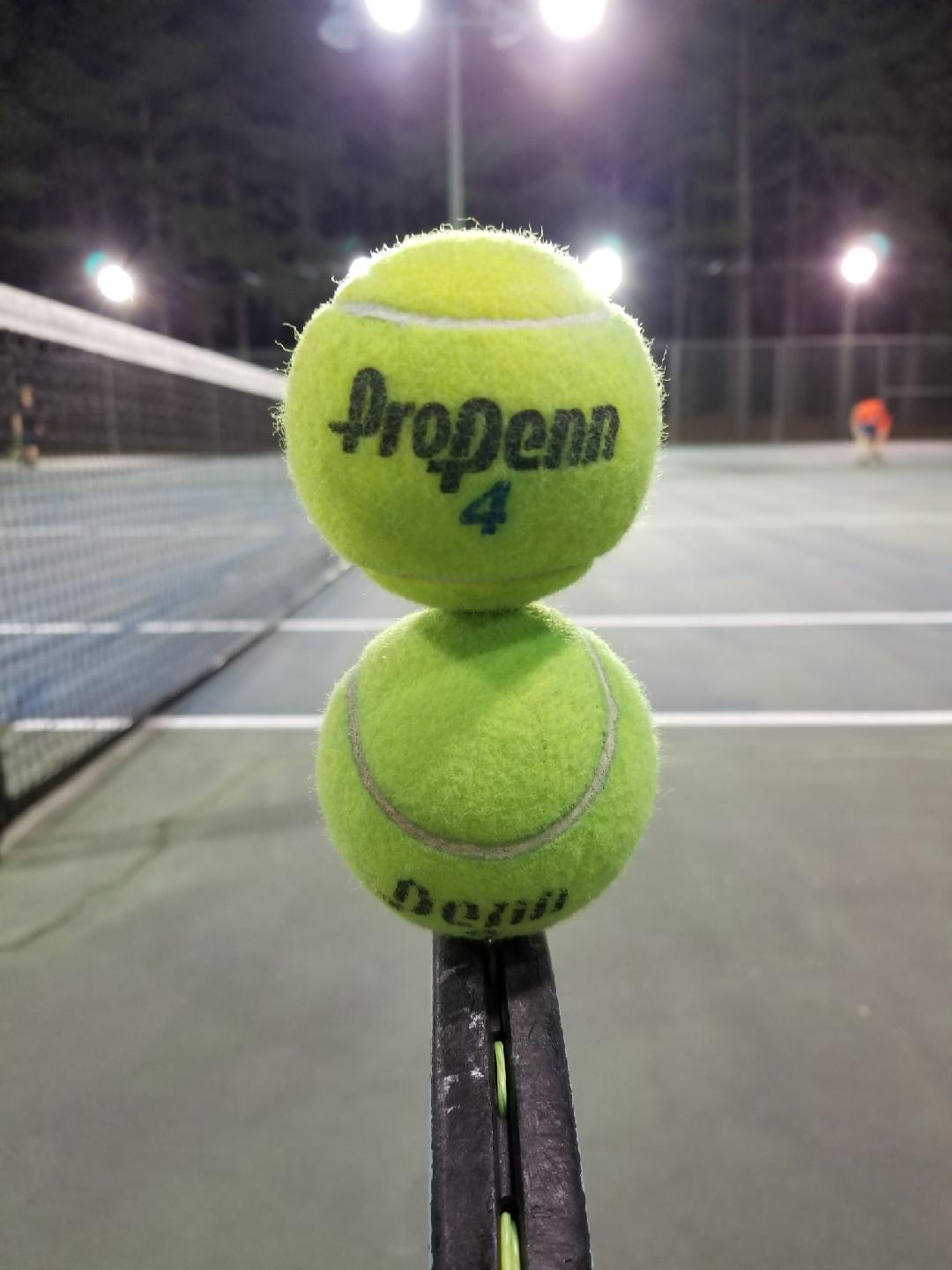 Tennis balls used for focused repetition and point-of-contact training